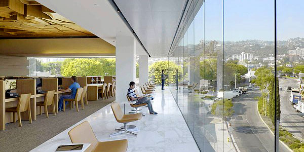 The new West Hollywood Library features a top level with floor-to-ceiling glass and views of the Hollywood Hills. (Benny Chan / Fotoworks / September 28, 2011) www.latimes.com