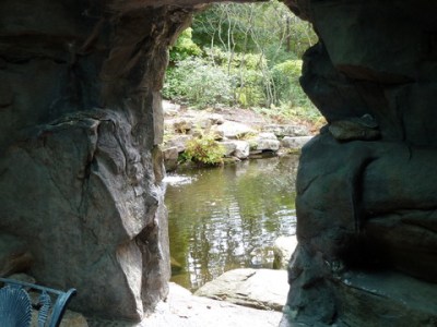 Looking out from the nymphaeum over the koi pond at the White Garden. Photo Credit: Fenella Pearson, ASID